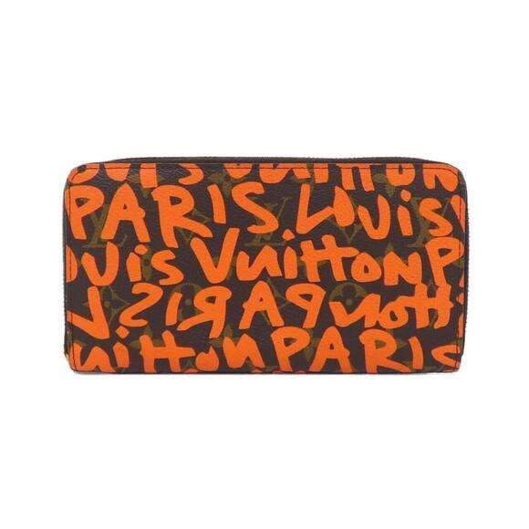 LOUIS VUITTON Orange Monogram Wallet - Picture 1 of 7